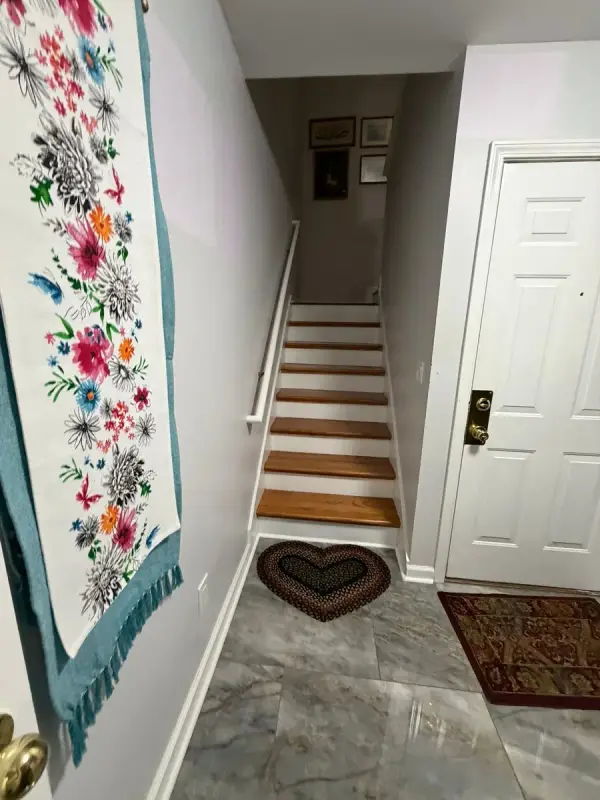 Narrow stair with white risers and white door, Brentwood, TN