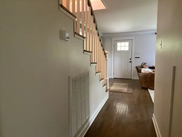 Stair hall with white spindles and tan walls, Fairview, TN