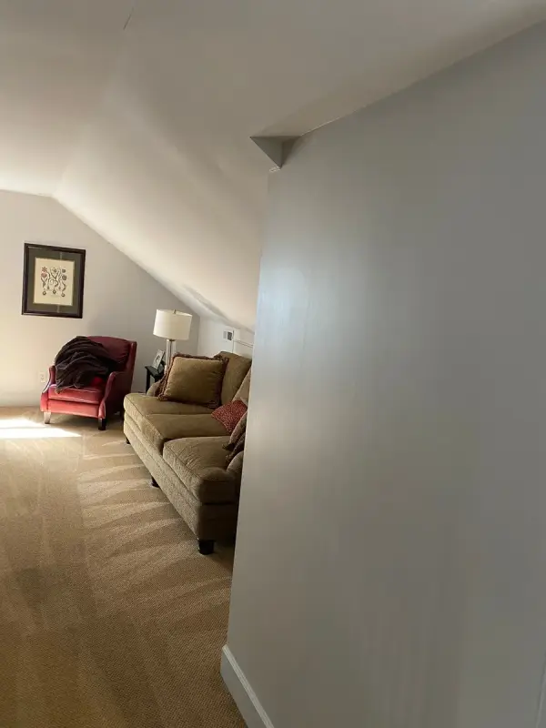 Upstairs sitting area with white walls under a sloped ceiling, Belle Meade, TN