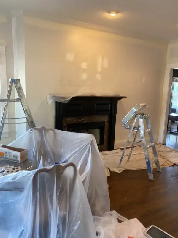 Room mid-project with ladders and furniture under plastic, Brentwood, TN