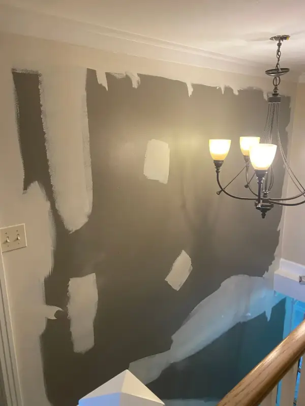 Dark gray wall spotted with patching compound beside a chandelier, Fairview, TN