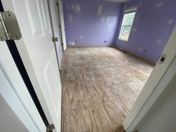 Lavender bedroom seen between two white doors, Pleasant View, TN