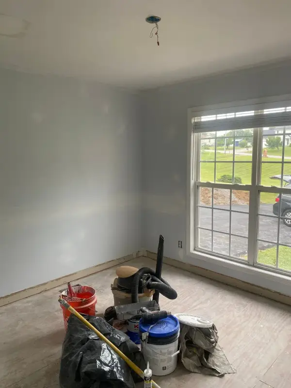 Light gray bedroom with buckets and tools on the floor, Pleasant View, TN