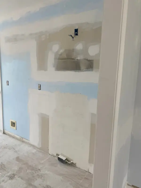 Wall with blue patches and joint compound, Pleasant View, TN