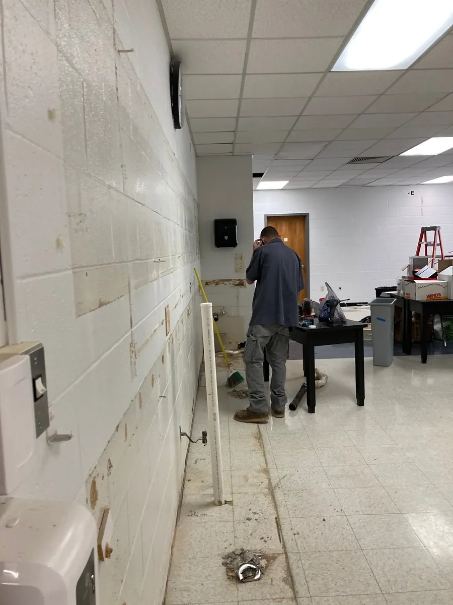 The Overbrook Catholic School science lab mid-remodel, walls being refreshed before painting