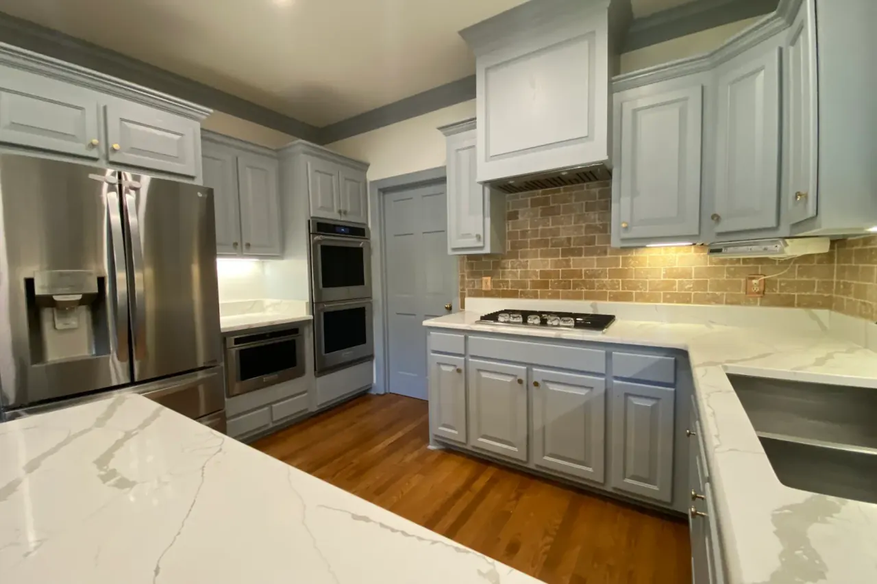 Kitchen cabinets painted a soft gray-blue, one of our cabinet painting projects for Belle Meade homes
