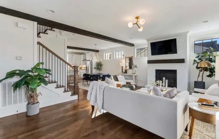 Open living room with smooth walls after drywall repair and fresh paint, interior painting for a Bellevue home