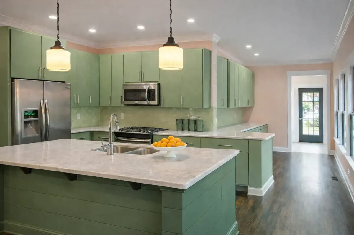 Kitchen cabinets with a factory-smooth HVLP spray finish, part of the cabinet painting we do for Bellevue homes