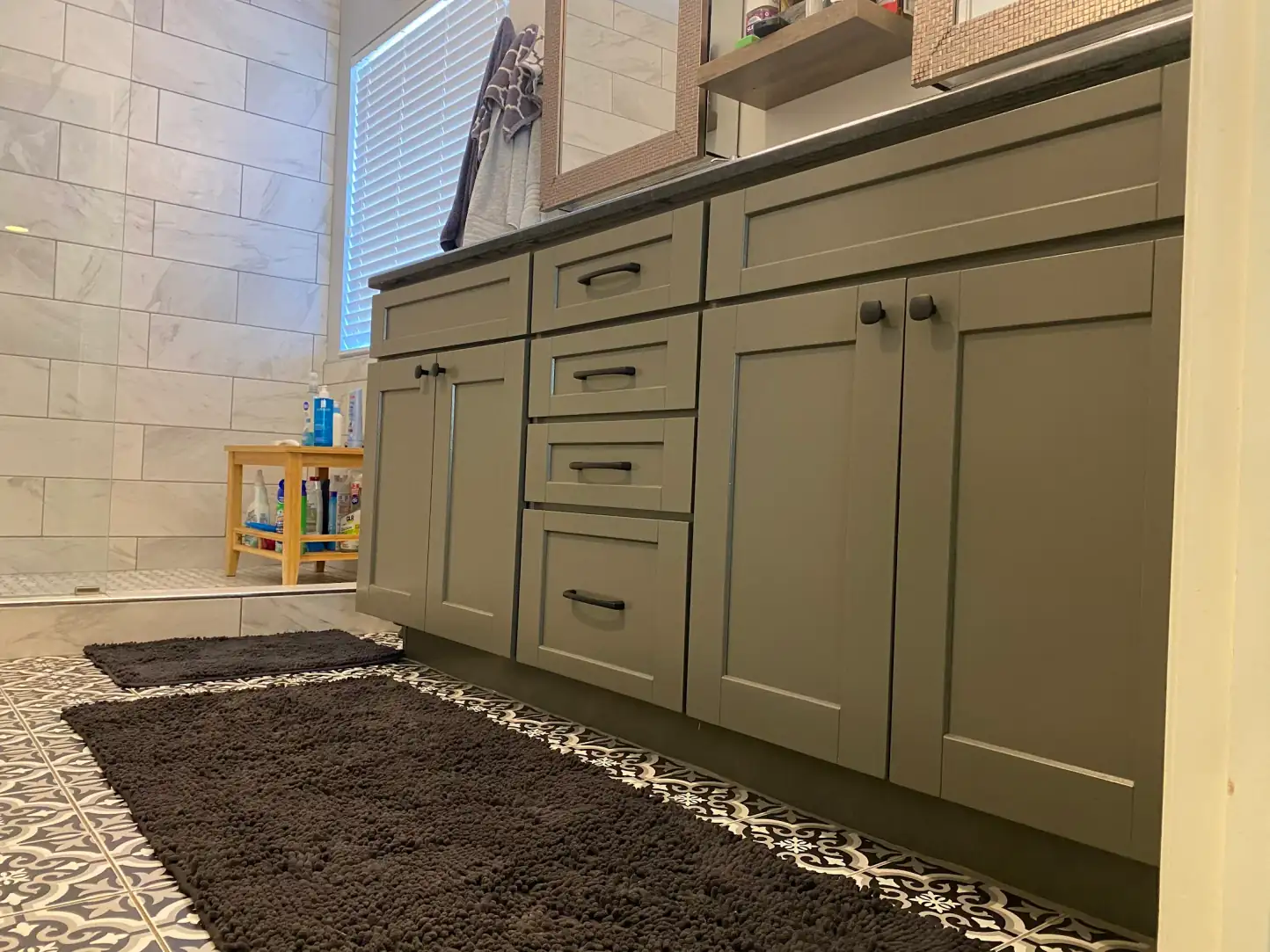 Barbara K.'s bathroom vanity, sprayed a deep olive green under the black granite top, cabinet painting for your Bellevue home