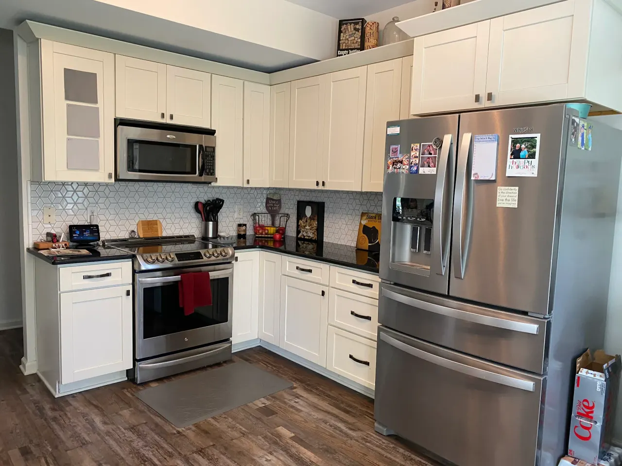 Barbara K.'s cream kitchen cabinets before painting, cabinet painting for Belle Meade homes