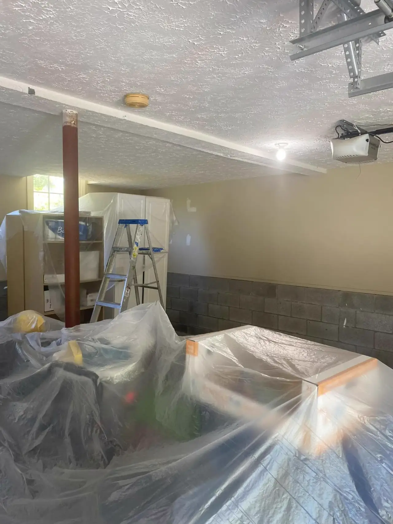 Caroline M.'s garage walls prepared for painting, interior painting for Belle Meade homes